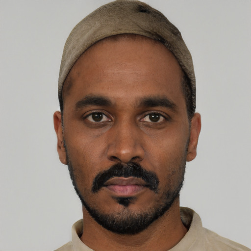 Neutral black young-adult male with short  black hair and brown eyes