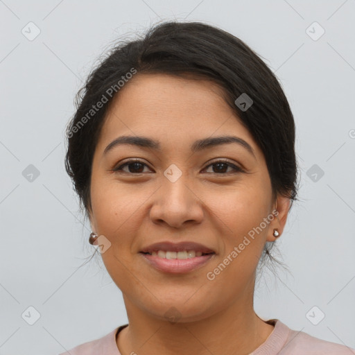 Joyful latino young-adult female with short  brown hair and brown eyes