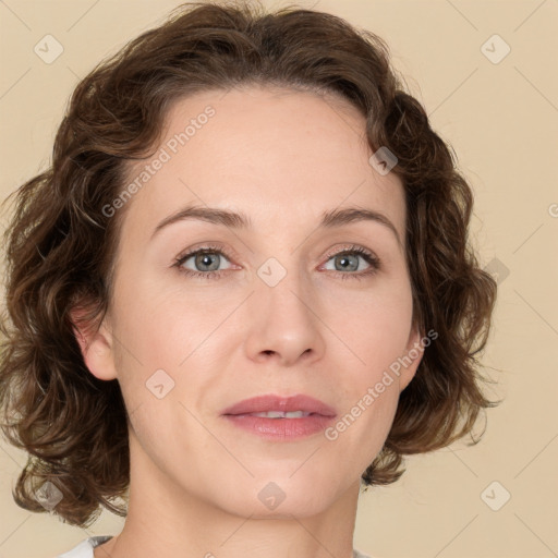 Joyful white young-adult female with medium  brown hair and green eyes