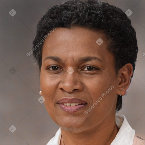 Joyful black adult female with short  brown hair and brown eyes