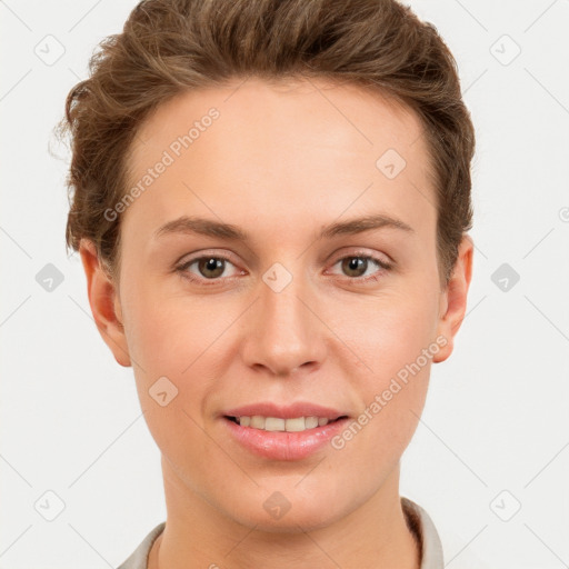 Joyful white young-adult female with short  brown hair and grey eyes