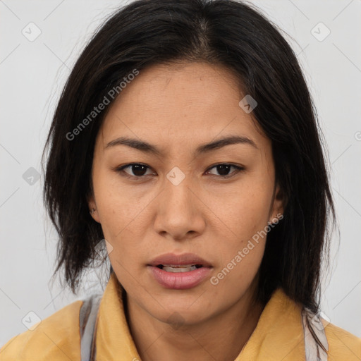 Joyful asian young-adult female with long  brown hair and brown eyes