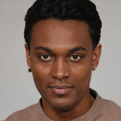 Neutral black young-adult male with short  black hair and brown eyes