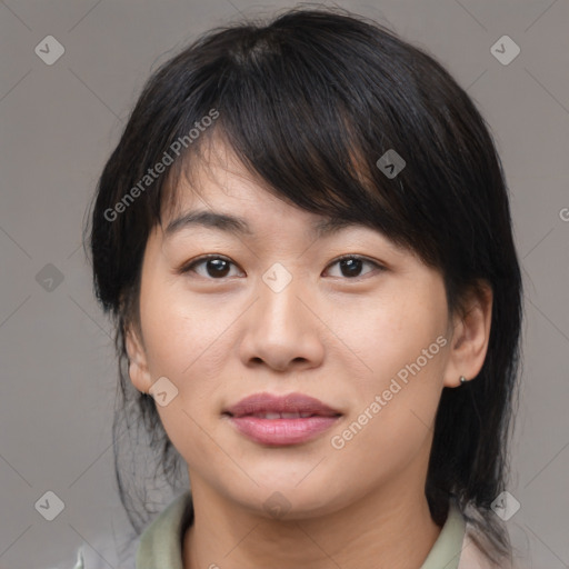 Joyful asian young-adult female with medium  brown hair and brown eyes