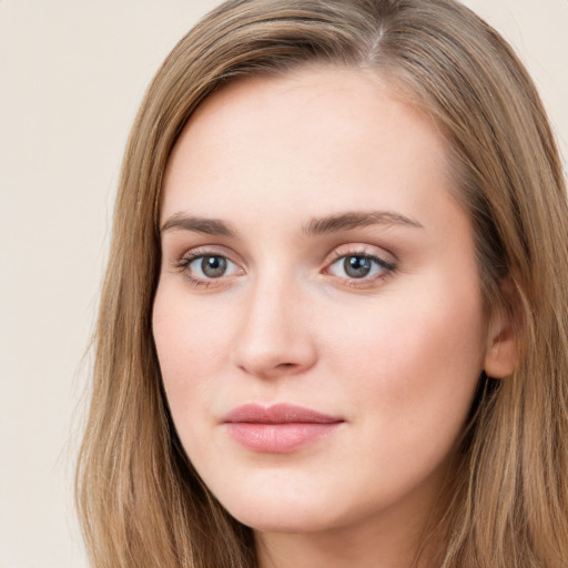 Neutral white young-adult female with long  brown hair and grey eyes