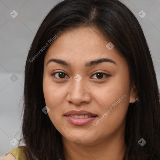 Joyful asian young-adult female with long  brown hair and brown eyes