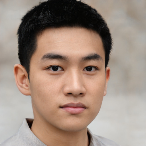 Neutral asian young-adult male with short  brown hair and brown eyes