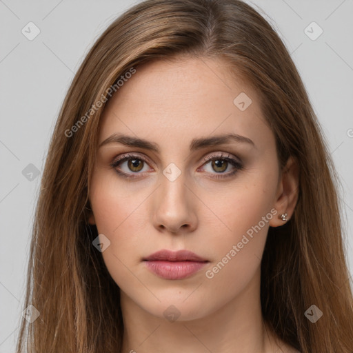 Neutral white young-adult female with long  brown hair and brown eyes