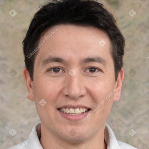 Joyful white adult male with short  brown hair and brown eyes