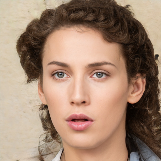 Neutral white young-adult female with medium  brown hair and green eyes