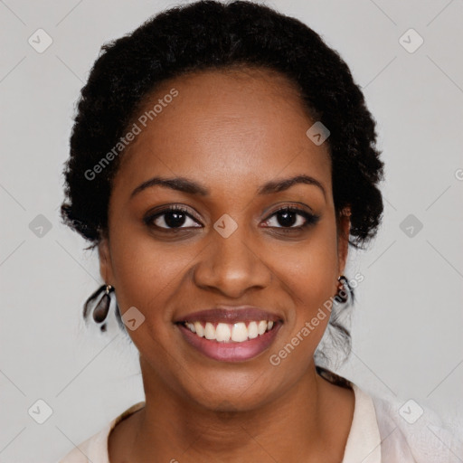 Joyful black young-adult female with medium  black hair and brown eyes