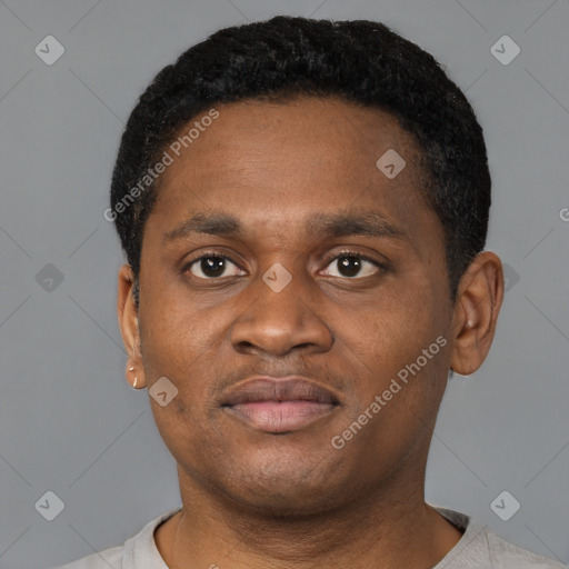 Joyful black young-adult male with short  brown hair and brown eyes