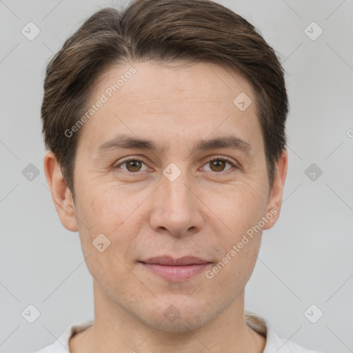 Joyful white adult male with short  brown hair and brown eyes