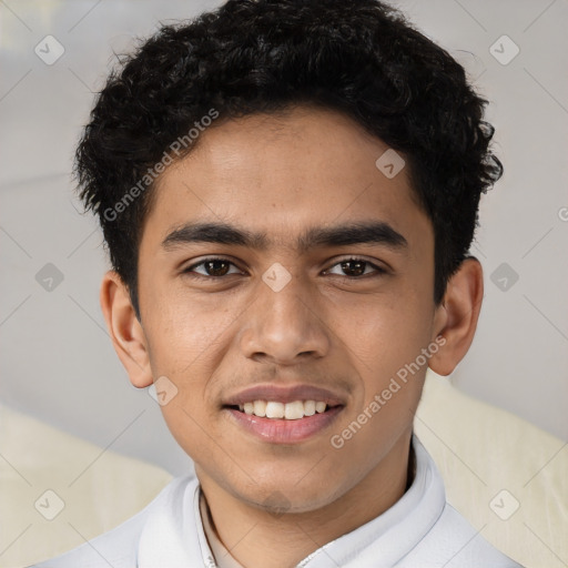 Joyful latino young-adult male with short  brown hair and brown eyes