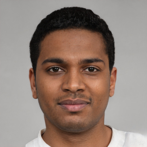 Neutral black young-adult male with short  black hair and brown eyes