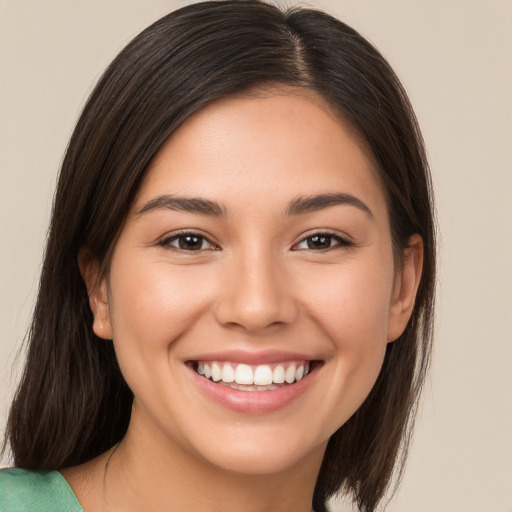 Joyful white young-adult female with medium  brown hair and brown eyes