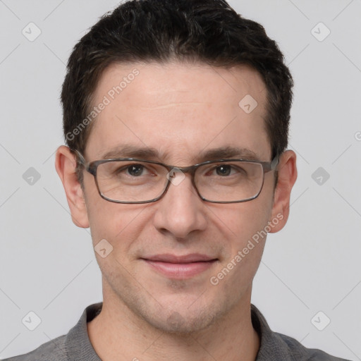 Joyful white adult male with short  brown hair and grey eyes