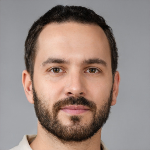 Neutral white young-adult male with short  brown hair and brown eyes