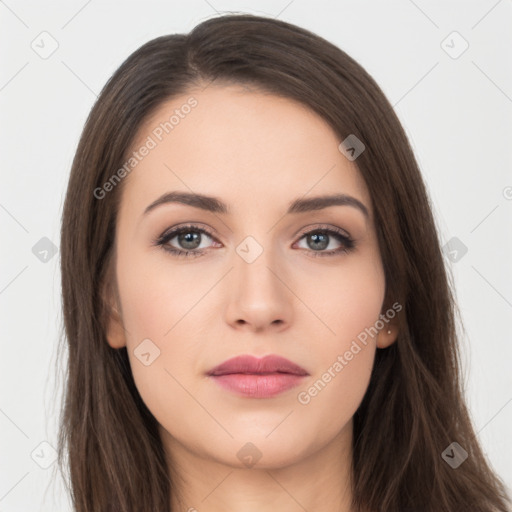 Neutral white young-adult female with long  brown hair and brown eyes