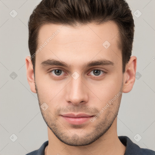 Neutral white young-adult male with short  brown hair and brown eyes