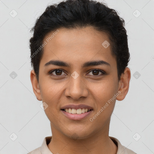 Joyful latino young-adult female with short  brown hair and brown eyes