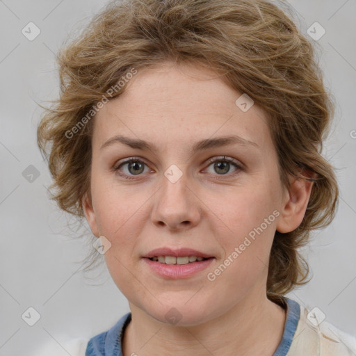 Joyful white young-adult female with medium  brown hair and blue eyes