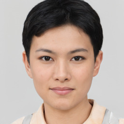 Joyful asian young-adult female with short  black hair and brown eyes