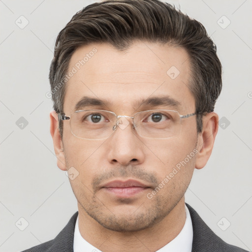 Neutral white adult male with short  brown hair and brown eyes