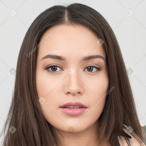 Neutral white young-adult female with long  brown hair and brown eyes