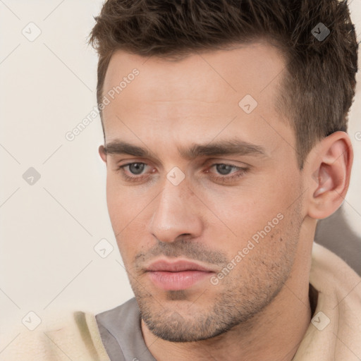 Neutral white young-adult male with short  brown hair and brown eyes