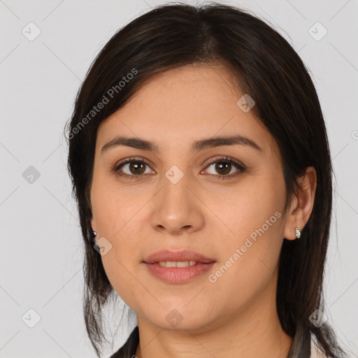 Joyful white young-adult female with medium  brown hair and brown eyes