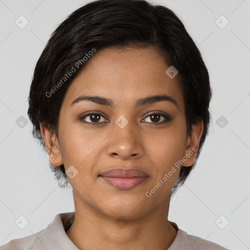 Joyful latino young-adult female with short  black hair and brown eyes