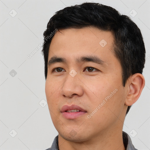 Neutral asian young-adult male with short  black hair and brown eyes