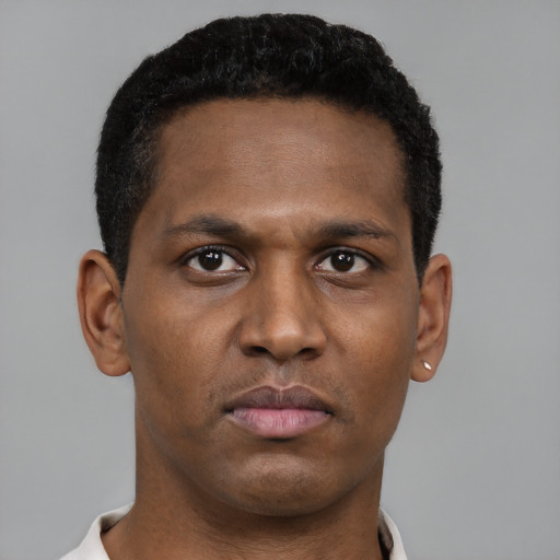 Neutral black young-adult male with short  brown hair and brown eyes