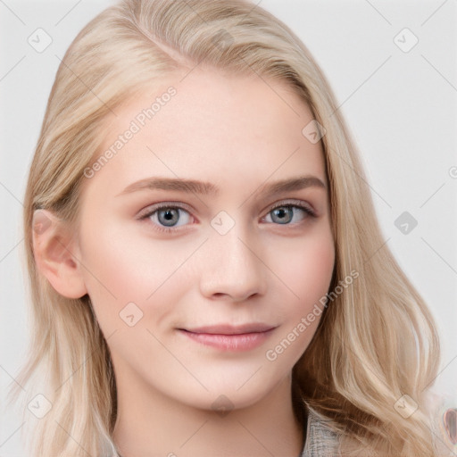 Joyful white young-adult female with long  brown hair and blue eyes