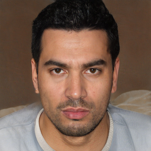 Neutral white young-adult male with short  black hair and brown eyes