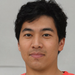 Neutral asian young-adult male with short  brown hair and brown eyes