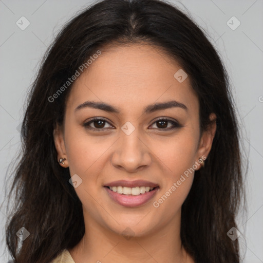 Joyful latino young-adult female with long  brown hair and brown eyes