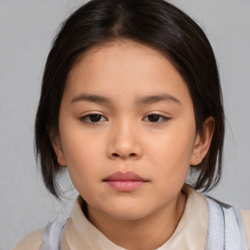 Neutral asian child female with medium  brown hair and brown eyes