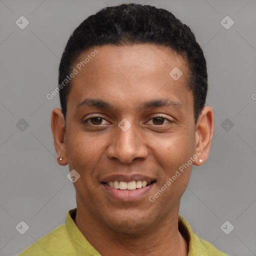 Joyful latino young-adult male with short  black hair and brown eyes