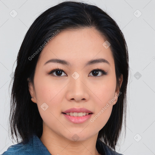 Joyful asian young-adult female with medium  black hair and brown eyes