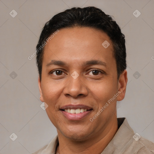 Joyful latino adult male with short  black hair and brown eyes