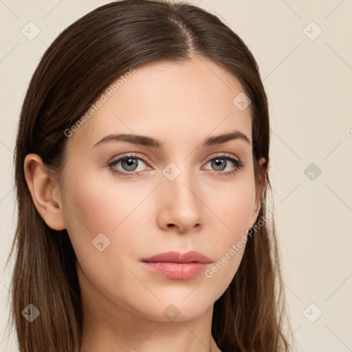 Neutral white young-adult female with long  brown hair and brown eyes