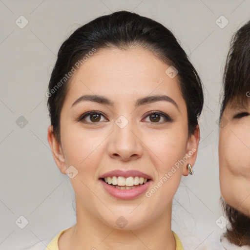 Joyful asian young-adult female with medium  brown hair and brown eyes