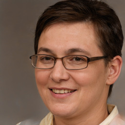 Joyful white adult female with short  brown hair and brown eyes