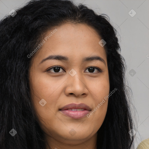 Joyful latino young-adult female with long  brown hair and brown eyes