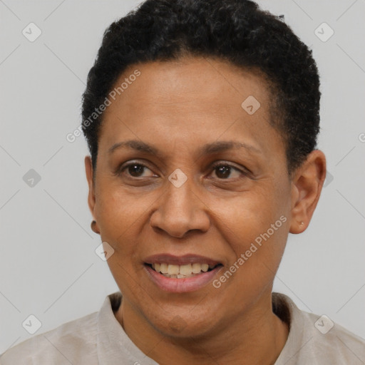 Joyful latino adult female with short  brown hair and brown eyes