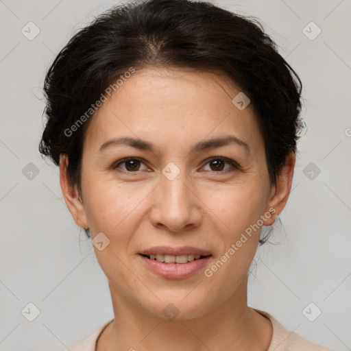 Joyful white adult female with short  brown hair and brown eyes