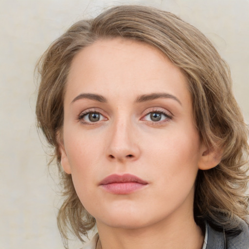 Neutral white young-adult female with medium  brown hair and grey eyes