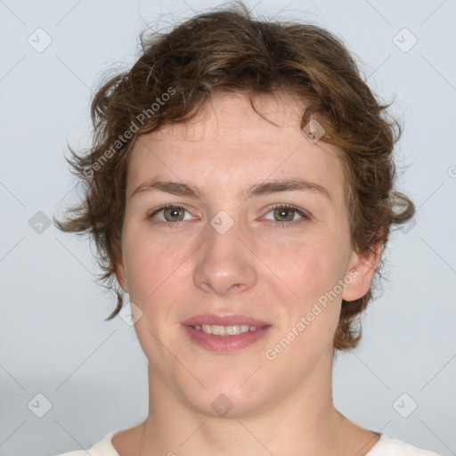 Joyful white young-adult female with medium  brown hair and green eyes